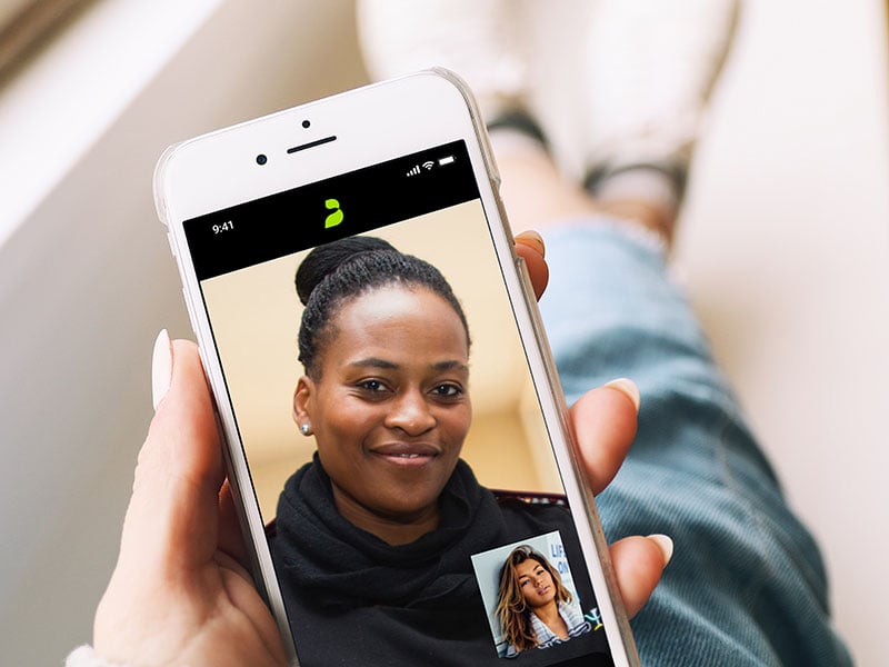 patient and doctor talking on a video call